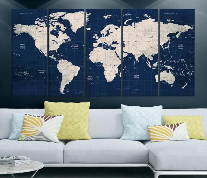 The modern living room is beautifully accented by the Dark Blue World Map Wall Art Canvas Print. This gallery-wrapped triptych features a dark blue backdrop that adds depth, creating a canvas of elegance on the wall.