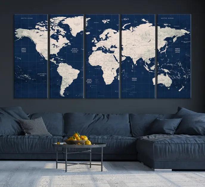 The modern living room is beautifully accented by the Dark Blue World Map Wall Art Canvas Print. This gallery-wrapped triptych features a dark blue backdrop that adds depth, creating a canvas of elegance on the wall.