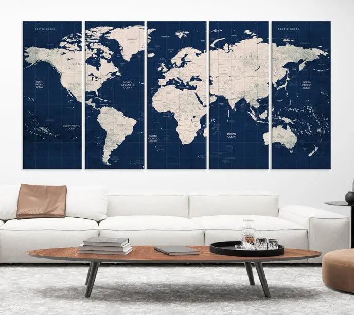 The modern living room is beautifully accented by the Dark Blue World Map Wall Art Canvas Print. This gallery-wrapped triptych features a dark blue backdrop that adds depth, creating a canvas of elegance on the wall.