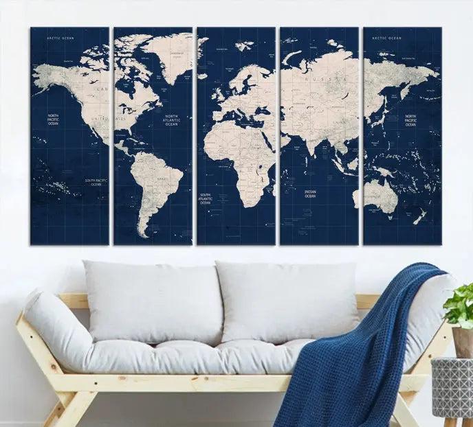 The modern living room is beautifully accented by the Dark Blue World Map Wall Art Canvas Print. This gallery-wrapped triptych features a dark blue backdrop that adds depth, creating a canvas of elegance on the wall.