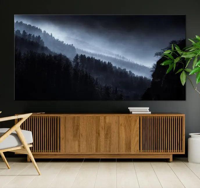 The Dark Forest Wall Art Canvas Print, featuring a UV-coated triptych of misty mountains, is crafted on museum-quality canvases to elevate the space.