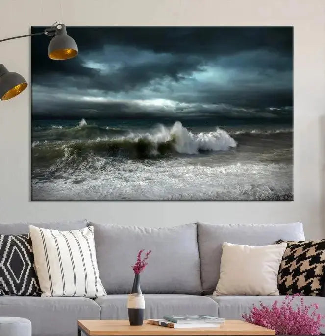 The Dark Storm Wall Art Canvas Print, featuring a breathtaking triptych of ocean waves, is expertly presented with gallery-wrapped edges and a UV-protective coating. It serves as a captivating centerpiece in this inviting living room.