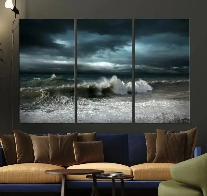 The Dark Storm Wall Art Canvas Print, featuring a breathtaking triptych of ocean waves, is expertly presented with gallery-wrapped edges and a UV-protective coating. It serves as a captivating centerpiece in this inviting living room.