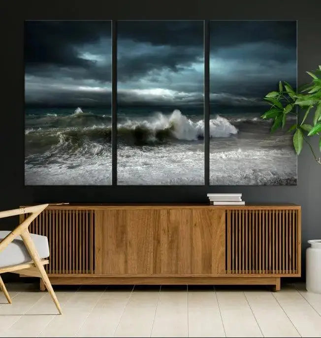 The Dark Storm Wall Art Canvas Print, featuring a breathtaking triptych of ocean waves, is expertly presented with gallery-wrapped edges and a UV-protective coating. It serves as a captivating centerpiece in this inviting living room.