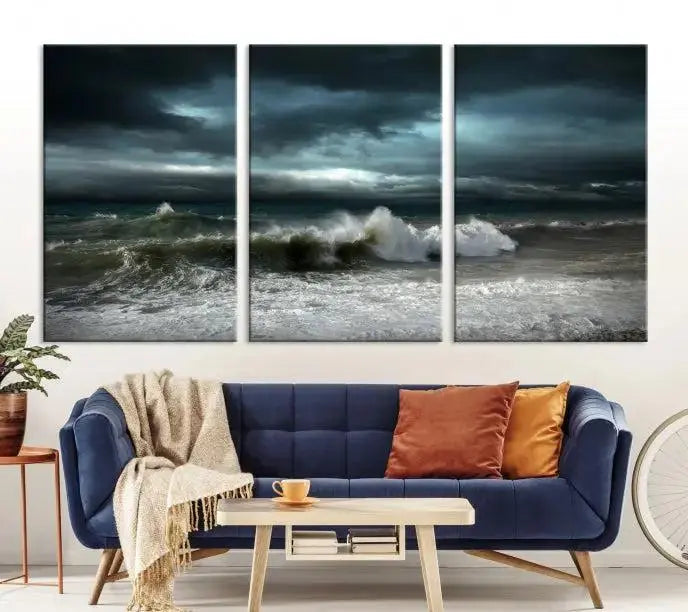 The Dark Storm Wall Art Canvas Print, featuring a breathtaking triptych of ocean waves, is expertly presented with gallery-wrapped edges and a UV-protective coating. It serves as a captivating centerpiece in this inviting living room.