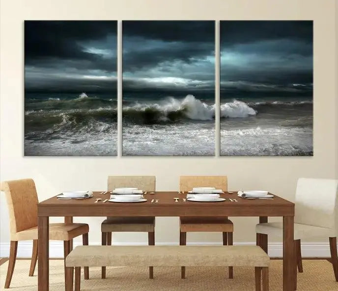 The Dark Storm Wall Art Canvas Print, featuring a breathtaking triptych of ocean waves, is expertly presented with gallery-wrapped edges and a UV-protective coating. It serves as a captivating centerpiece in this inviting living room.