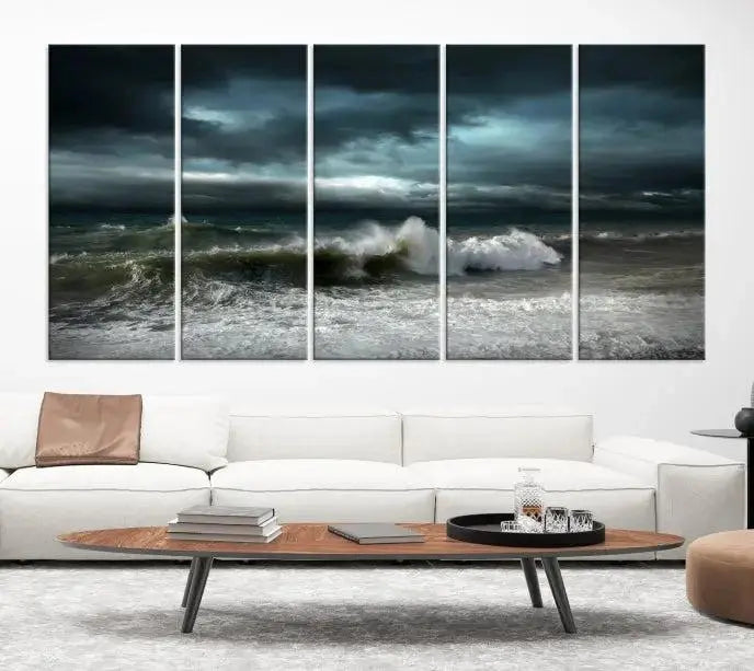 The Dark Storm Wall Art Canvas Print, featuring a breathtaking triptych of ocean waves, is expertly presented with gallery-wrapped edges and a UV-protective coating. It serves as a captivating centerpiece in this inviting living room.