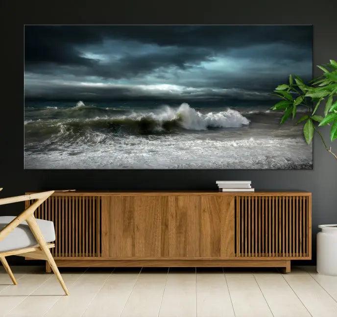 The Dark Storm Wall Art Canvas Print, featuring a breathtaking triptych of ocean waves, is expertly presented with gallery-wrapped edges and a UV-protective coating. It serves as a captivating centerpiece in this inviting living room.