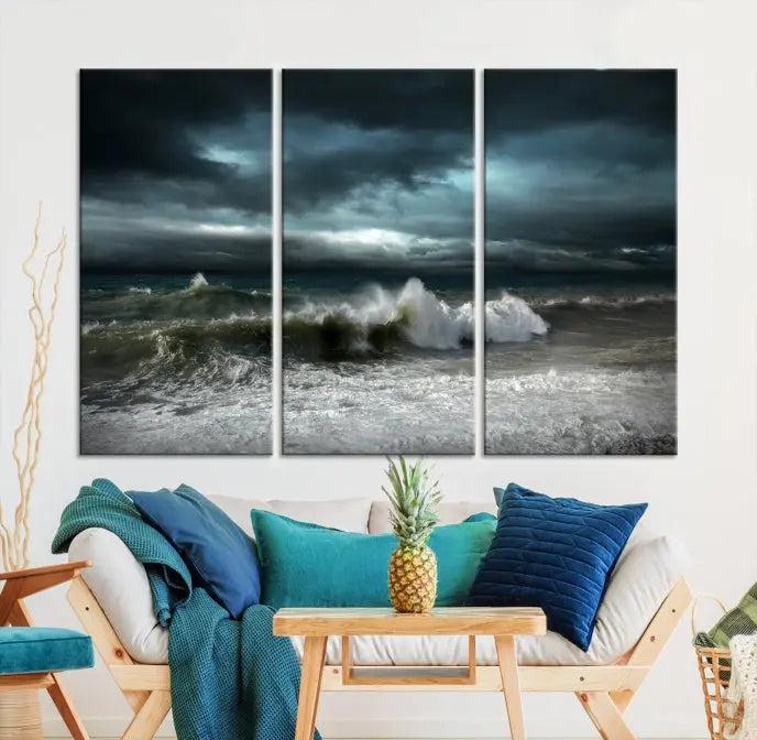 The Dark Storm Wall Art Canvas Print, featuring a breathtaking triptych of ocean waves, is expertly presented with gallery-wrapped edges and a UV-protective coating. It serves as a captivating centerpiece in this inviting living room.