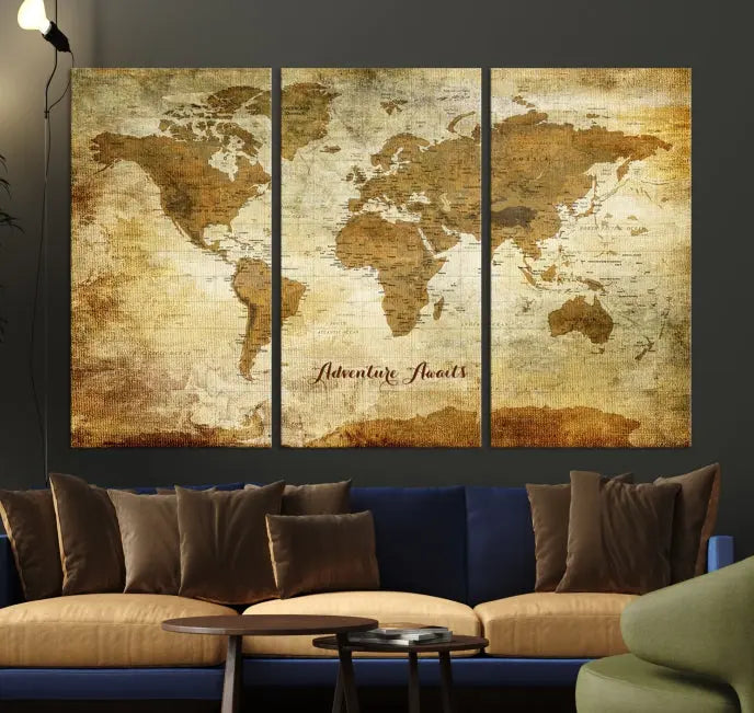 A Dark Theme World Map wall art canvas print, featuring the inspiring text "Adventure Awaits," hangs in this modern room. The map is crafted from museum-quality canvas and coated for UV protection, making it ready to hang.