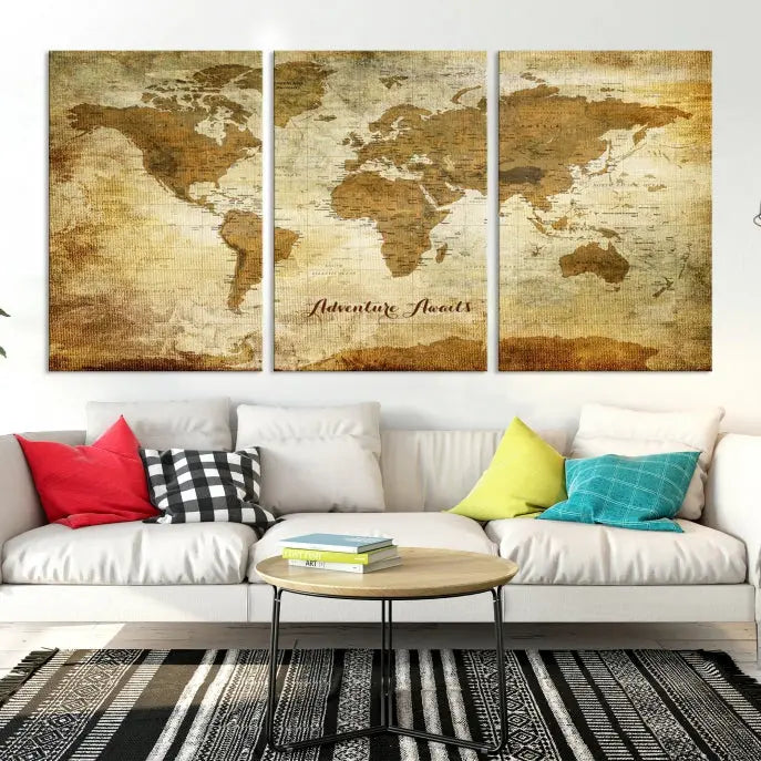 A Dark Theme World Map wall art canvas print, featuring the inspiring text "Adventure Awaits," hangs in this modern room. The map is crafted from museum-quality canvas and coated for UV protection, making it ready to hang.