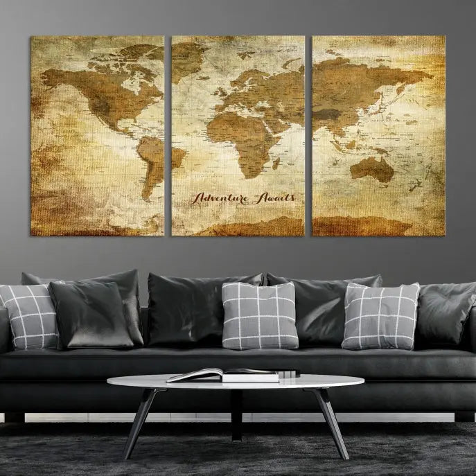 A Dark Theme World Map wall art canvas print, featuring the inspiring text "Adventure Awaits," hangs in this modern room. The map is crafted from museum-quality canvas and coated for UV protection, making it ready to hang.