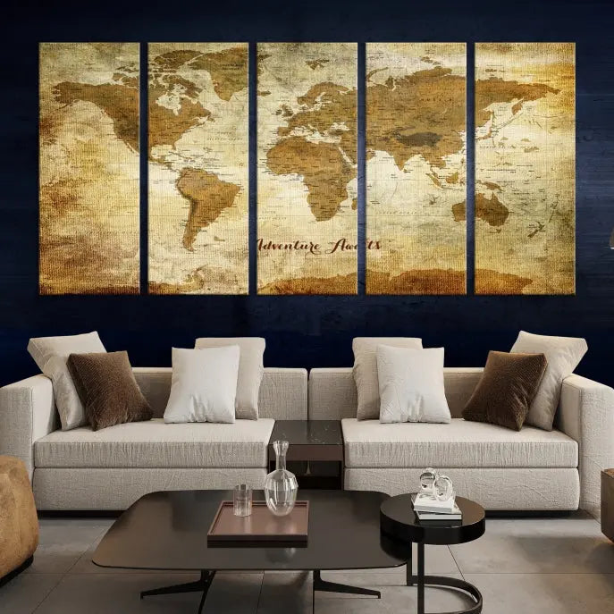 A Dark Theme World Map wall art canvas print, featuring the inspiring text "Adventure Awaits," hangs in this modern room. The map is crafted from museum-quality canvas and coated for UV protection, making it ready to hang.