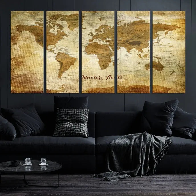 A Dark Theme World Map wall art canvas print, featuring the inspiring text "Adventure Awaits," hangs in this modern room. The map is crafted from museum-quality canvas and coated for UV protection, making it ready to hang.