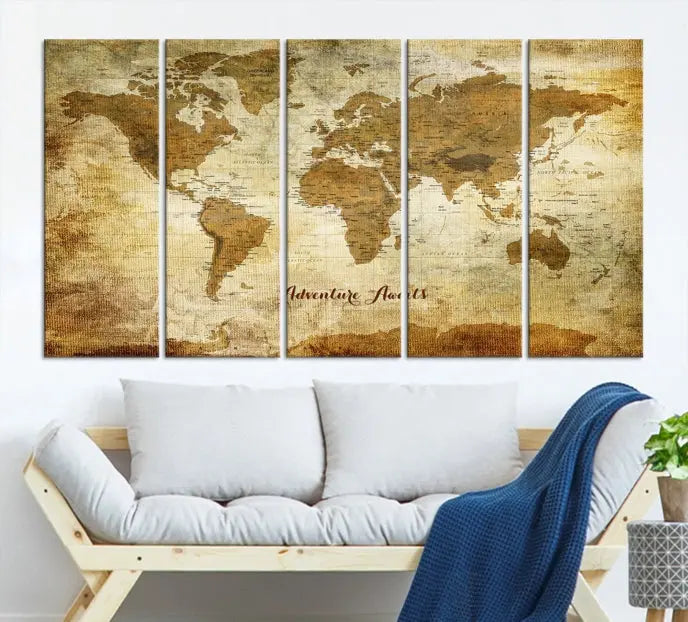 A Dark Theme World Map wall art canvas print, featuring the inspiring text "Adventure Awaits," hangs in this modern room. The map is crafted from museum-quality canvas and coated for UV protection, making it ready to hang.