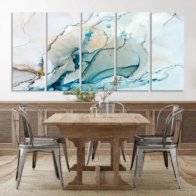 An abstract triptych of the Dark Turquoise Marble Fluid Effect on museum-quality canvas enhances the living room.