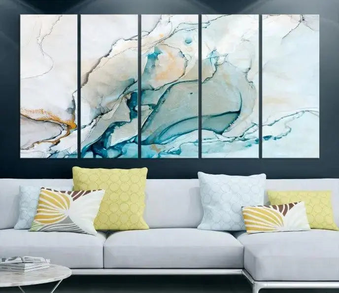 An abstract triptych of the Dark Turquoise Marble Fluid Effect on museum-quality canvas enhances the living room.