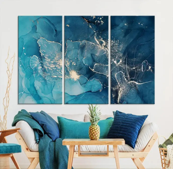 The wall is adorned with a triptych of abstract paintings titled "Dark Turquoise Marble Fluid Effect Wall Art Abstract Canvas Wall Art Print." These museum-quality canvases are ready to hang and feature a UV-protective coating to ensure lasting brilliance.