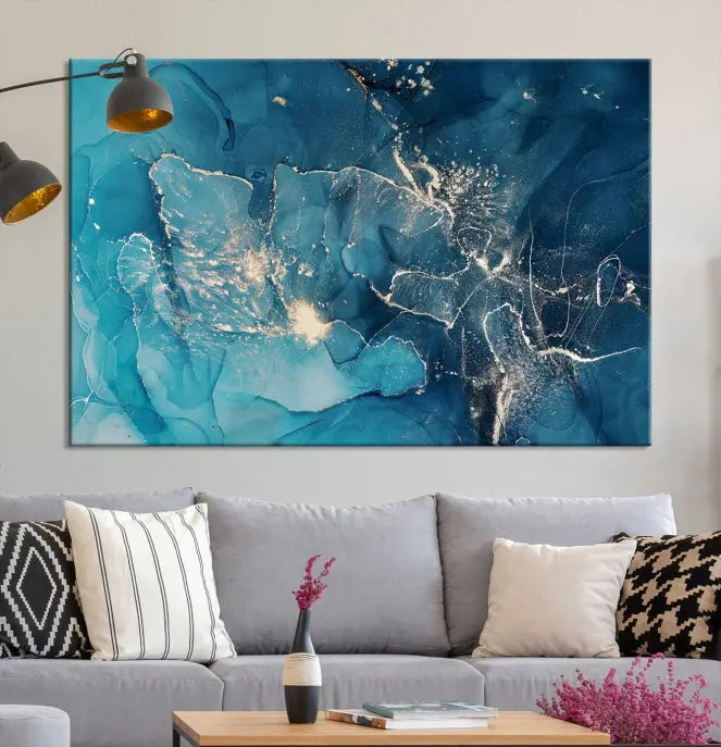 The wall is adorned with a triptych of abstract paintings titled "Dark Turquoise Marble Fluid Effect Wall Art Abstract Canvas Wall Art Print." These museum-quality canvases are ready to hang and feature a UV-protective coating to ensure lasting brilliance.