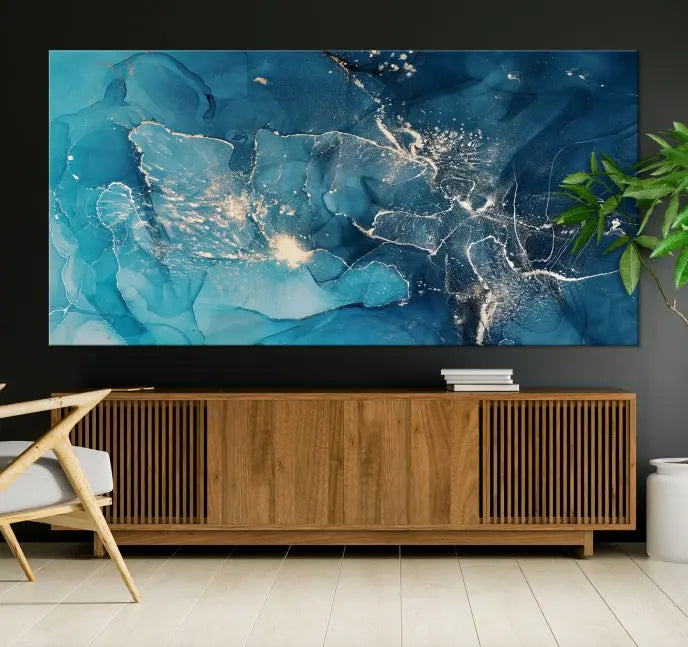 The wall is adorned with a triptych of abstract paintings titled "Dark Turquoise Marble Fluid Effect Wall Art Abstract Canvas Wall Art Print." These museum-quality canvases are ready to hang and feature a UV-protective coating to ensure lasting brilliance.