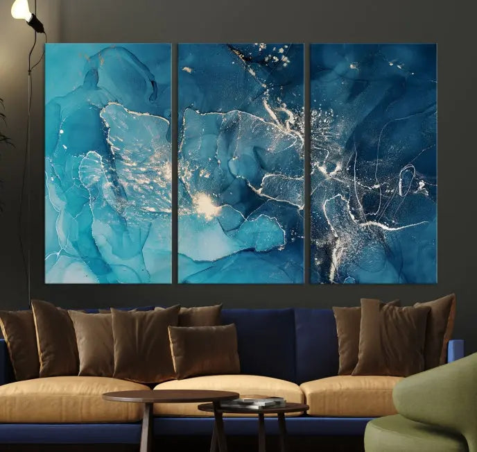 The wall is adorned with a triptych of abstract paintings titled "Dark Turquoise Marble Fluid Effect Wall Art Abstract Canvas Wall Art Print." These museum-quality canvases are ready to hang and feature a UV-protective coating to ensure lasting brilliance.