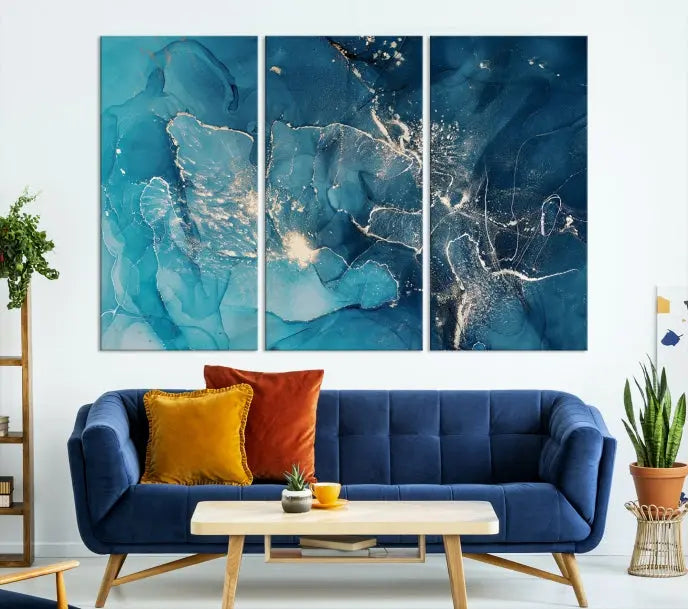 The wall is adorned with a triptych of abstract paintings titled "Dark Turquoise Marble Fluid Effect Wall Art Abstract Canvas Wall Art Print." These museum-quality canvases are ready to hang and feature a UV-protective coating to ensure lasting brilliance.