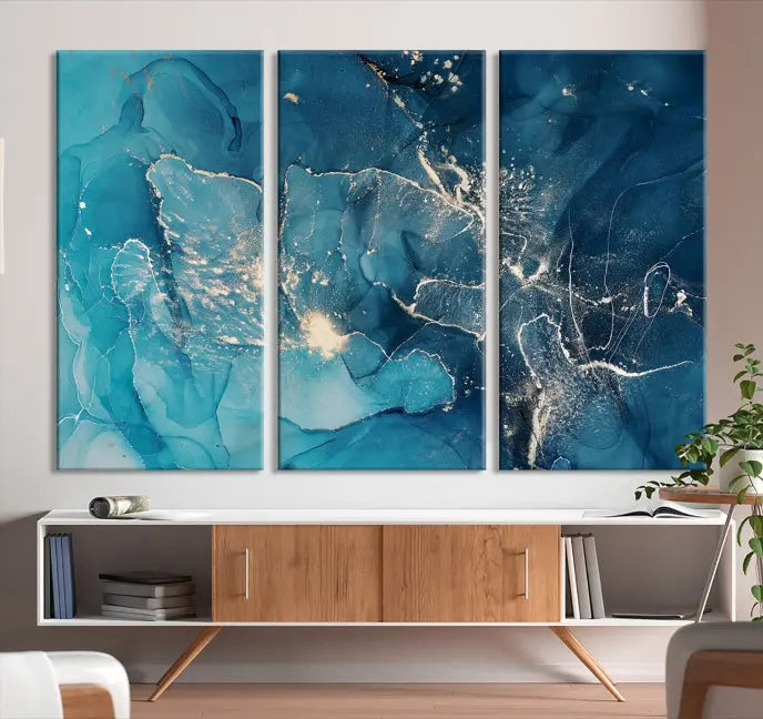 The wall is adorned with a triptych of abstract paintings titled "Dark Turquoise Marble Fluid Effect Wall Art Abstract Canvas Wall Art Print." These museum-quality canvases are ready to hang and feature a UV-protective coating to ensure lasting brilliance.