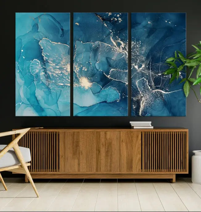 The wall is adorned with a triptych of abstract paintings titled "Dark Turquoise Marble Fluid Effect Wall Art Abstract Canvas Wall Art Print." These museum-quality canvases are ready to hang and feature a UV-protective coating to ensure lasting brilliance.