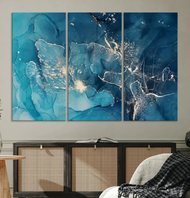 The wall is adorned with a triptych of abstract paintings titled "Dark Turquoise Marble Fluid Effect Wall Art Abstract Canvas Wall Art Print." These museum-quality canvases are ready to hang and feature a UV-protective coating to ensure lasting brilliance.