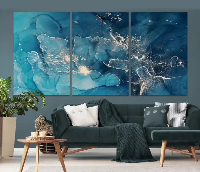 The wall is adorned with a triptych of abstract paintings titled "Dark Turquoise Marble Fluid Effect Wall Art Abstract Canvas Wall Art Print." These museum-quality canvases are ready to hang and feature a UV-protective coating to ensure lasting brilliance.