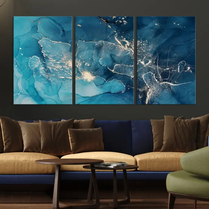 The wall is adorned with a triptych of abstract paintings titled "Dark Turquoise Marble Fluid Effect Wall Art Abstract Canvas Wall Art Print." These museum-quality canvases are ready to hang and feature a UV-protective coating to ensure lasting brilliance.