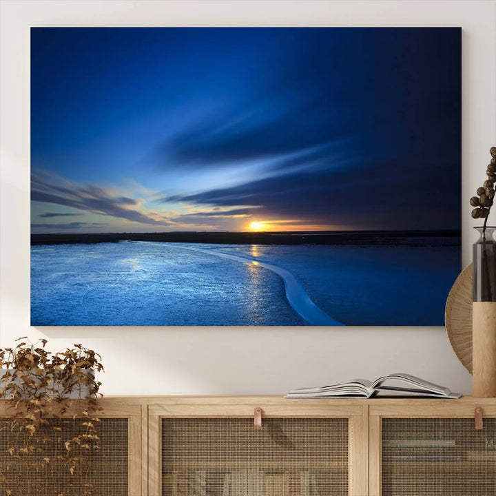 Deep blue ocean sunset triptych canvas art featuring a serene coastal sunset. Ideal for modern interiors. High-quality giclee canvas print.