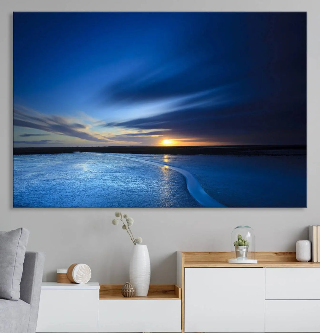 Deep blue ocean sunset triptych canvas art featuring a serene coastal sunset. Ideal for modern interiors. High-quality giclee canvas print.