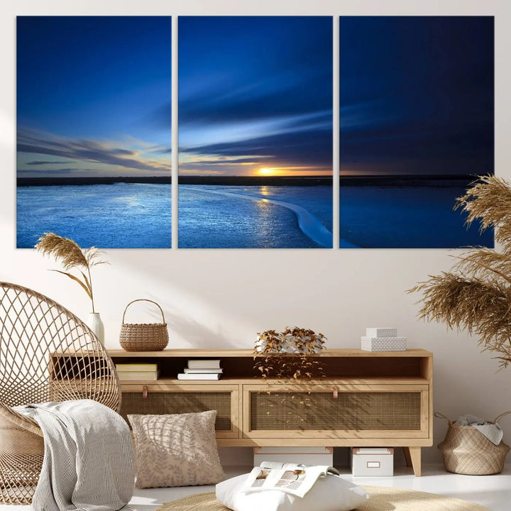 Deep blue ocean sunset triptych canvas art featuring a serene coastal sunset. Ideal for modern interiors. High-quality giclee canvas print.