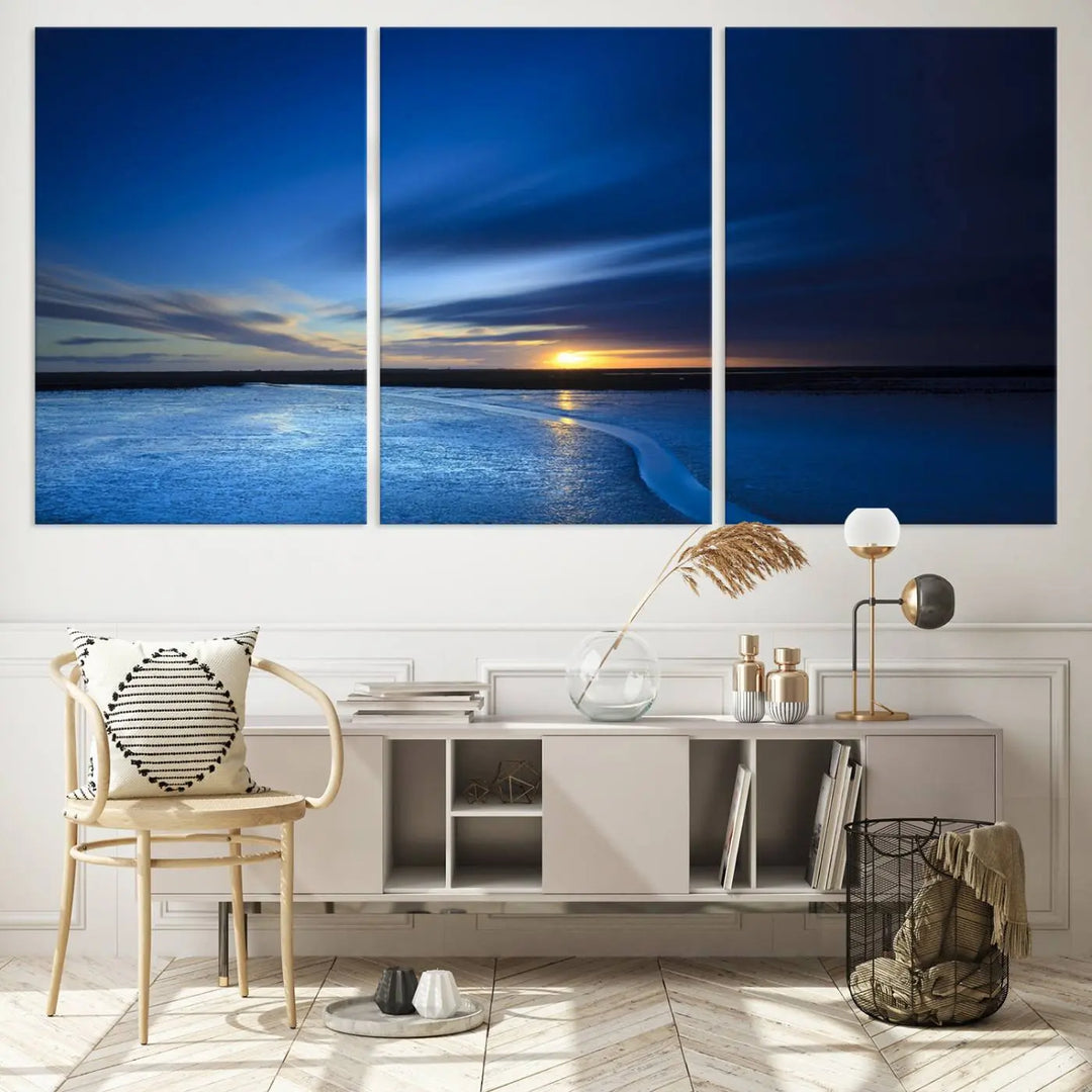 Deep blue ocean sunset triptych canvas art featuring a serene coastal sunset. Ideal for modern interiors. High-quality giclee canvas print.