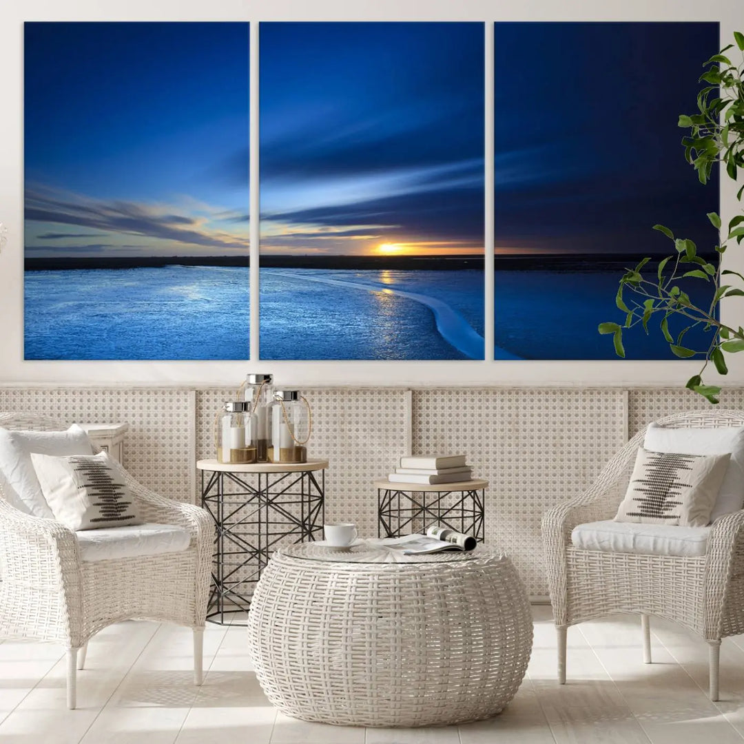 Deep blue ocean sunset triptych canvas art featuring a serene coastal sunset. Ideal for modern interiors. High-quality giclee canvas print.