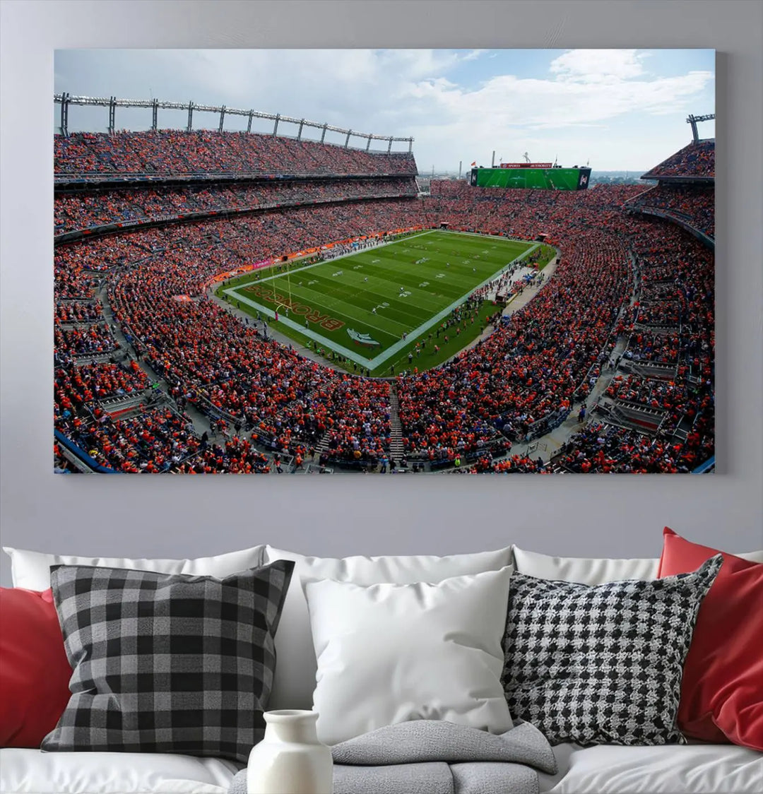 A triptych wall art titled "Denver Broncos Football Team Print - Empower Field at Mile High Stadium" is crafted on museum-quality canvas using high-resolution printing for stunning detail.