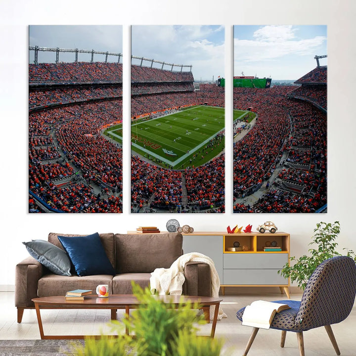 A triptych wall art titled "Denver Broncos Football Team Print - Empower Field at Mile High Stadium" is crafted on museum-quality canvas using high-resolution printing for stunning detail.