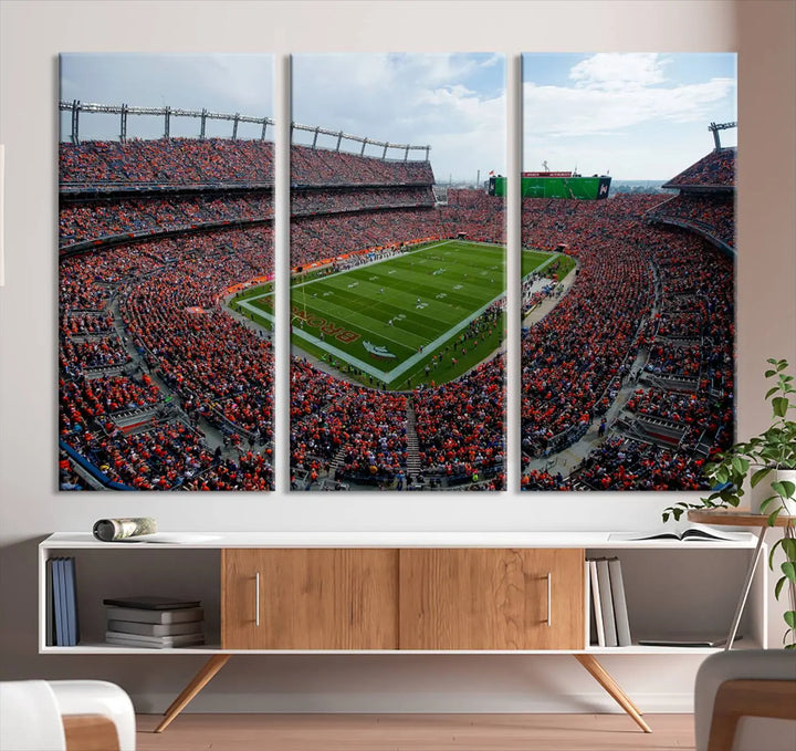 A triptych wall art titled "Denver Broncos Football Team Print - Empower Field at Mile High Stadium" is crafted on museum-quality canvas using high-resolution printing for stunning detail.