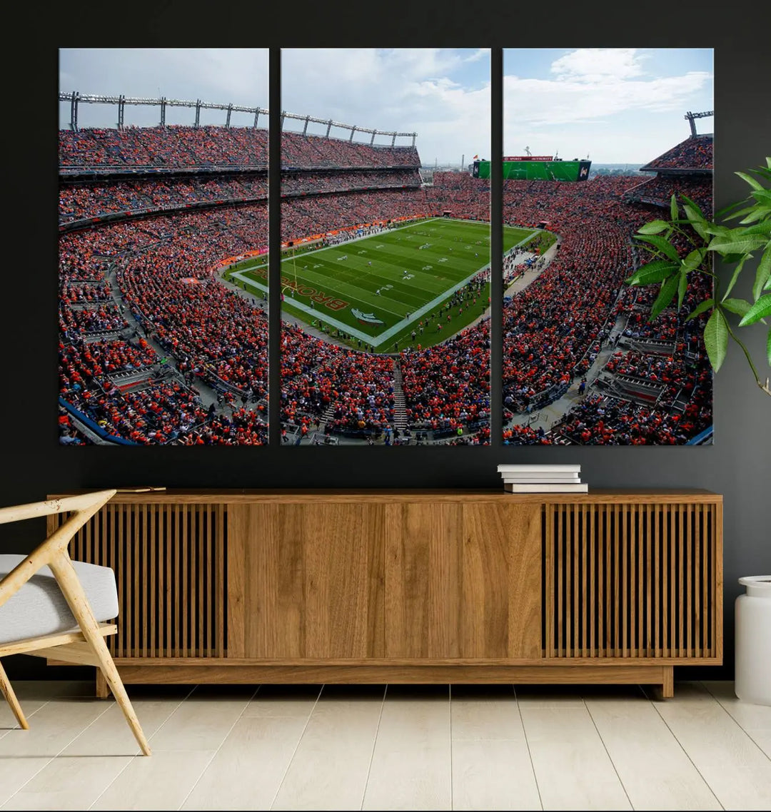 A triptych wall art titled "Denver Broncos Football Team Print - Empower Field at Mile High Stadium" is crafted on museum-quality canvas using high-resolution printing for stunning detail.