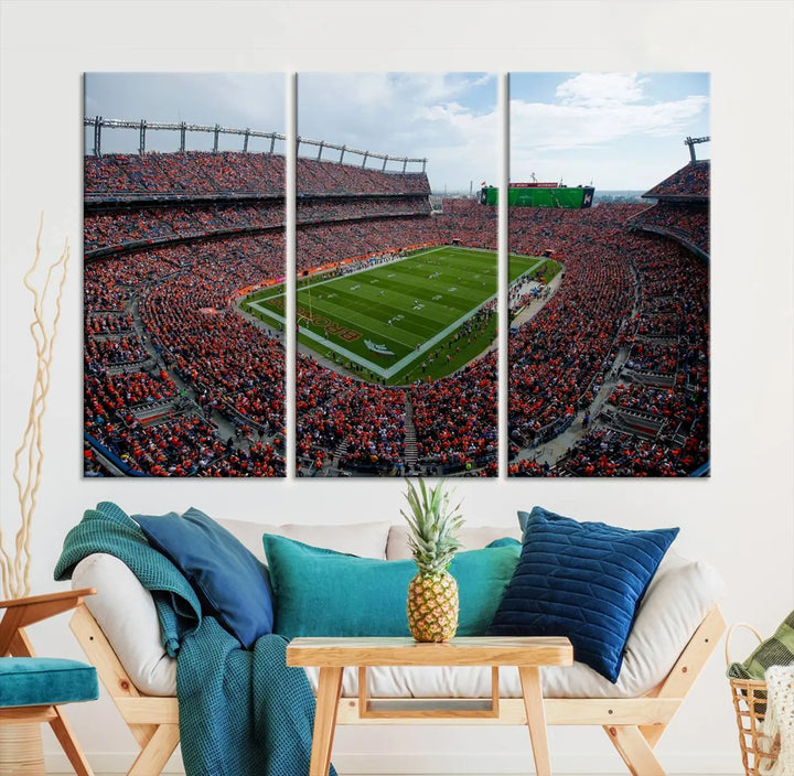 A triptych wall art titled "Denver Broncos Football Team Print - Empower Field at Mile High Stadium" is crafted on museum-quality canvas using high-resolution printing for stunning detail.