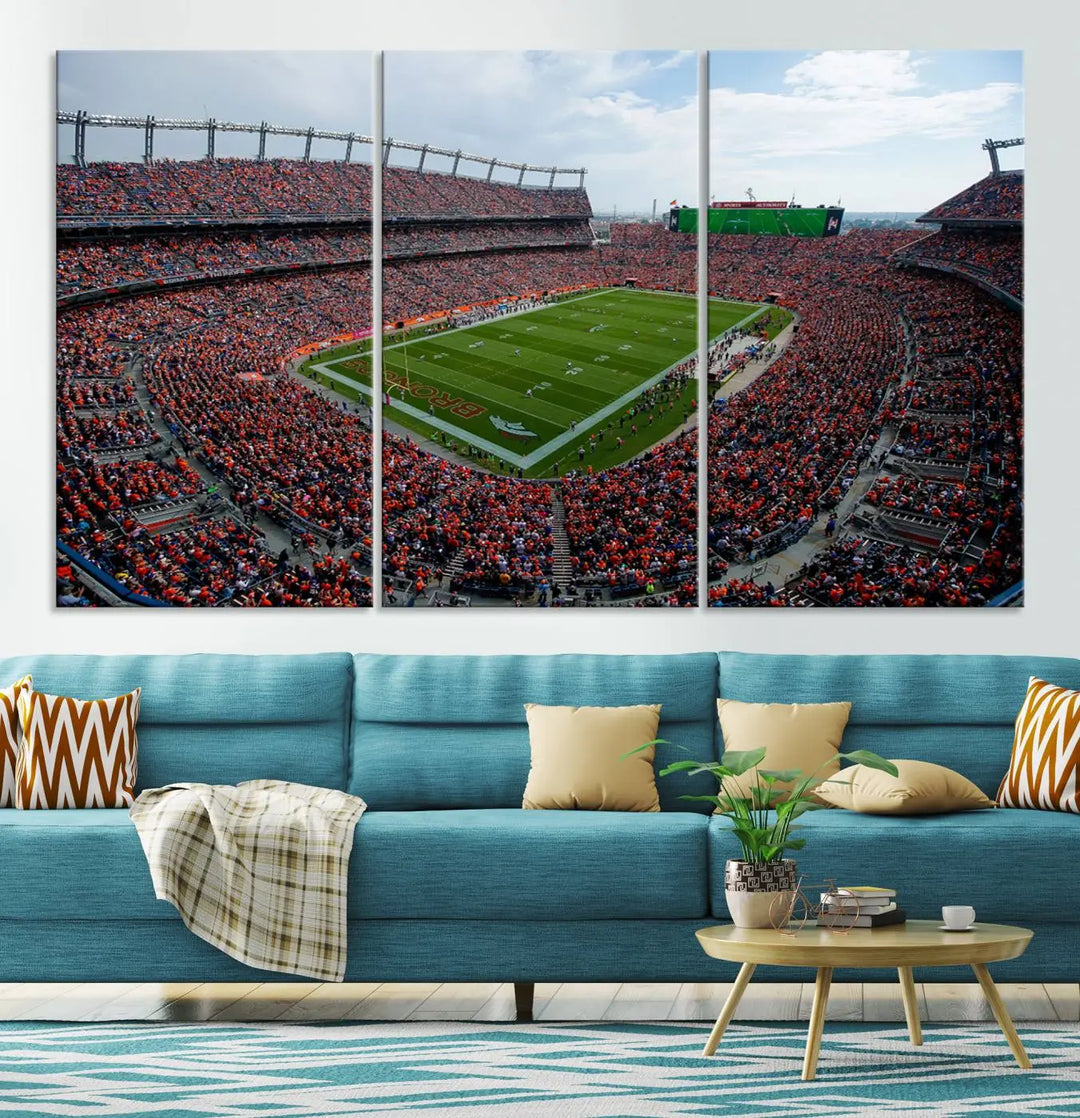 A triptych wall art titled "Denver Broncos Football Team Print - Empower Field at Mile High Stadium" is crafted on museum-quality canvas using high-resolution printing for stunning detail.