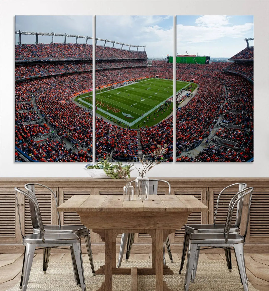 A triptych wall art titled "Denver Broncos Football Team Print - Empower Field at Mile High Stadium" is crafted on museum-quality canvas using high-resolution printing for stunning detail.