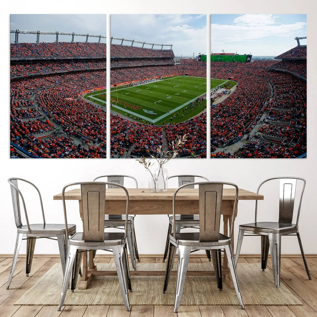 A triptych wall art titled "Denver Broncos Football Team Print - Empower Field at Mile High Stadium" is crafted on museum-quality canvas using high-resolution printing for stunning detail.