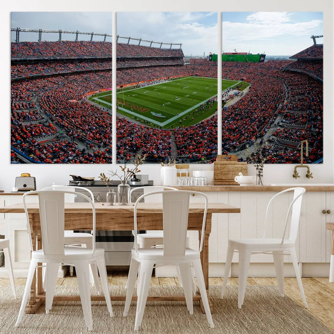 A triptych wall art titled "Denver Broncos Football Team Print - Empower Field at Mile High Stadium" is crafted on museum-quality canvas using high-resolution printing for stunning detail.