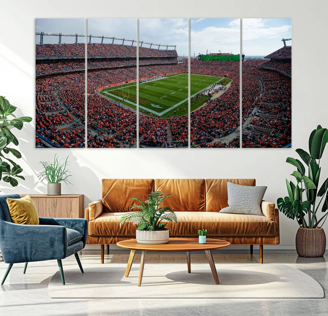 A triptych wall art titled "Denver Broncos Football Team Print - Empower Field at Mile High Stadium" is crafted on museum-quality canvas using high-resolution printing for stunning detail.