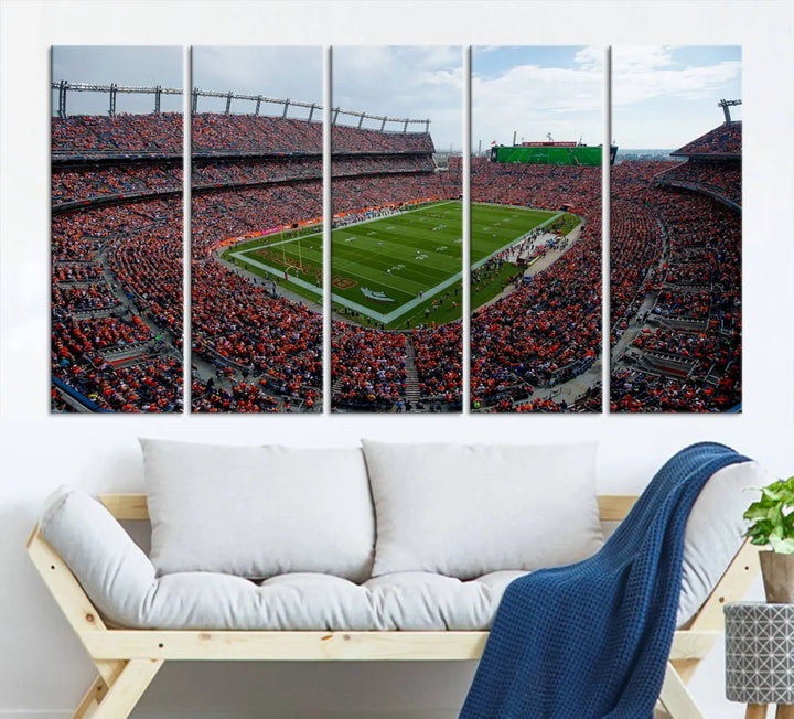 A triptych wall art titled "Denver Broncos Football Team Print - Empower Field at Mile High Stadium" is crafted on museum-quality canvas using high-resolution printing for stunning detail.