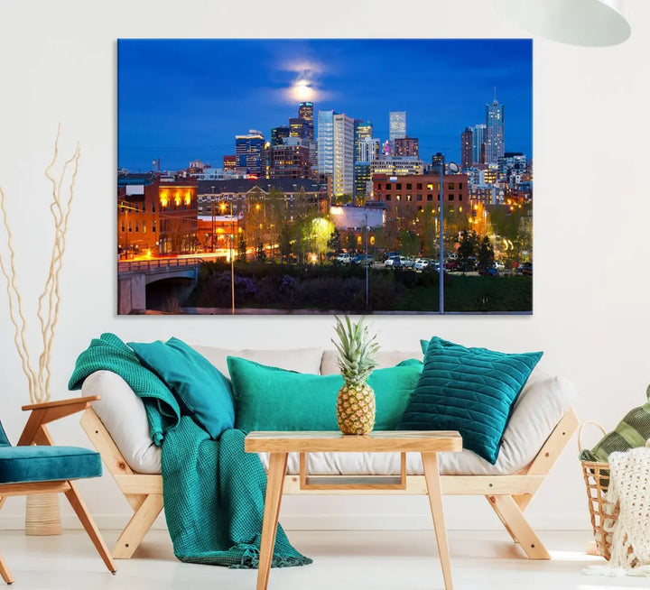 The Denver City Lights Night Blue Skyline Cityscape View Wall Art Canvas Print showcases a stunning night cityscape. Printed on museum-quality canvas with a UV-protective coating, this artwork comes ready to hang, adding an effortless touch of elegance.