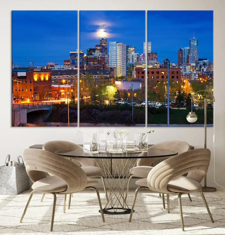 The Denver City Lights Night Blue Skyline Cityscape View Wall Art Canvas Print showcases a stunning night cityscape. Printed on museum-quality canvas with a UV-protective coating, this artwork comes ready to hang, adding an effortless touch of elegance.