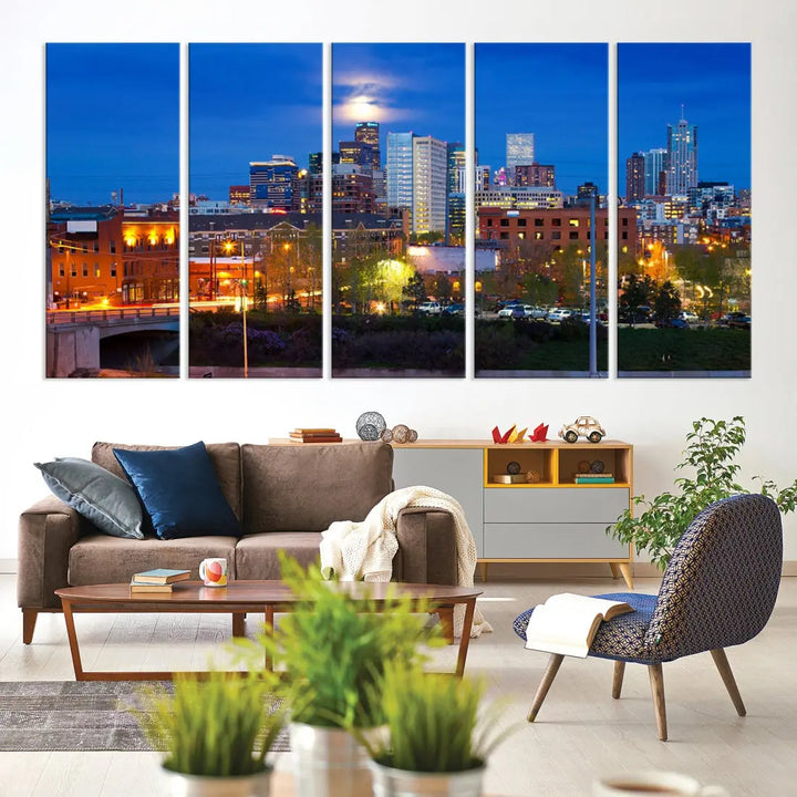 The Denver City Lights Night Blue Skyline Cityscape View Wall Art Canvas Print showcases a stunning night cityscape. Printed on museum-quality canvas with a UV-protective coating, this artwork comes ready to hang, adding an effortless touch of elegance.